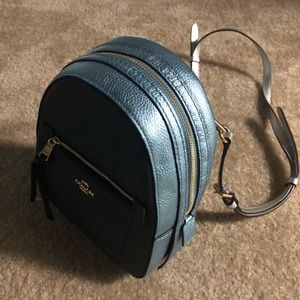 I am selling a Coach leather backpack.